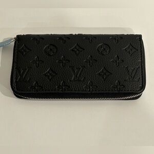 LV Leather Embossed Wallet